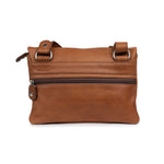 Schuyler bag in high-quality vegetable-tanned leather with zip compartment, showcasing timeless elegance and practicality.