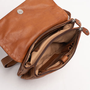 
                  
                    Load image into Gallery viewer, Schuyler bag interior showcasing the zip compartment and mobile holder, crafted from sustainable vegetable-tanned leather.
                  
                