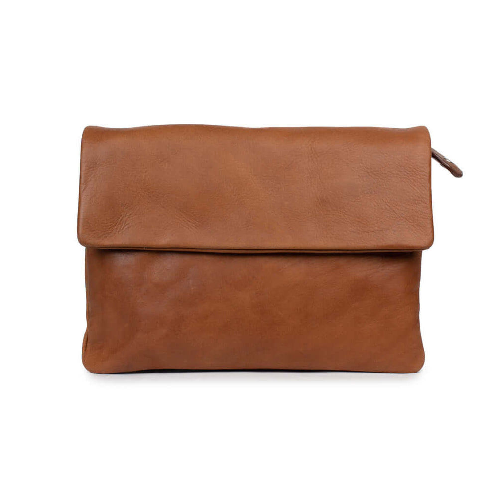 Schuyler bag in vegetable-tanned leather, crafted for durability and elegance, featuring a minimalist design and versatile use.