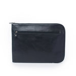 Black Zip Folio made from vegetable-tanned leather, featuring external zip compartment and minimalist design.